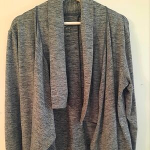 Nike dri-fit women's size medium, light weight cardigan. Grey with thumb holes.